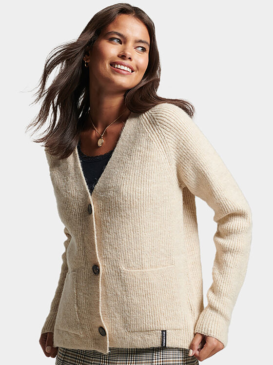 Beige cardigan with buttons and pockets - 1