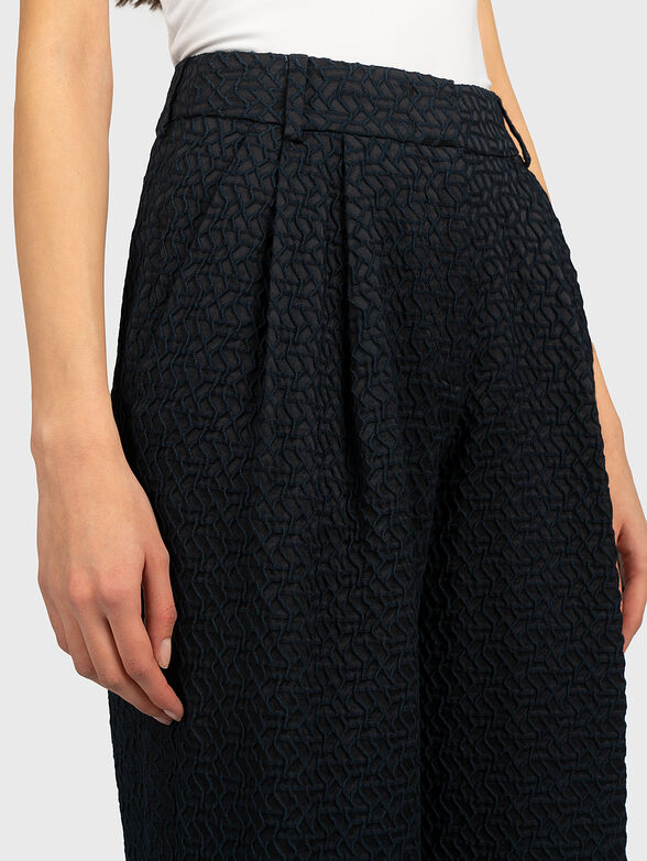 Embroidered pants in dark blue - 1
