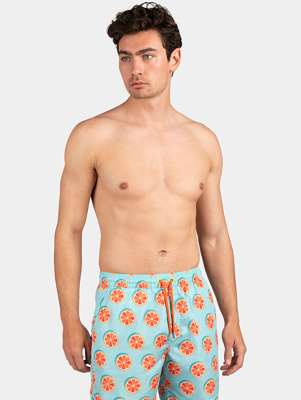 Black swim trunks with lemon print - 1