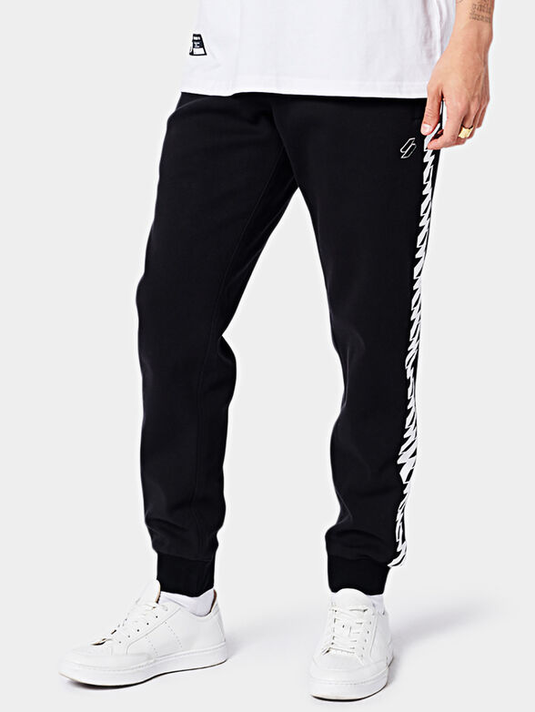 Pants with contrasting details - 1