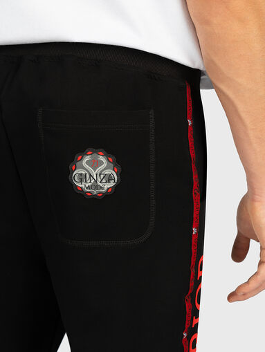 Sports pants with contrasting print - 5