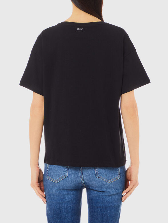 Black blouse with accent lines - 1