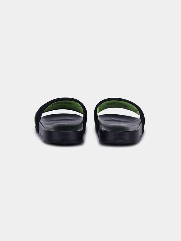Slide sandals in black - 4