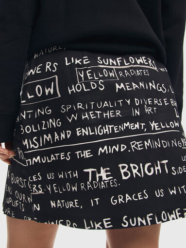 Black mini skirt with contrast print  - 2