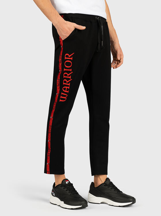 Sports pants with contrasting print - 1