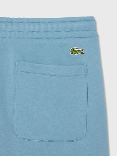 Cotton shorts with logo print in ecru - 4