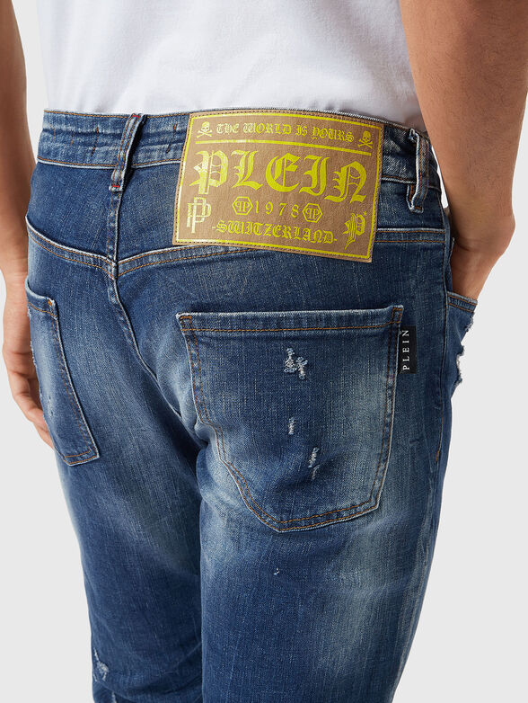 Blue jeans with washed effect and accent rips - 3
