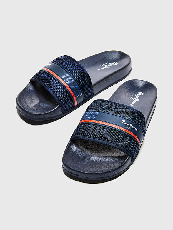 Slide sandals in black - 4