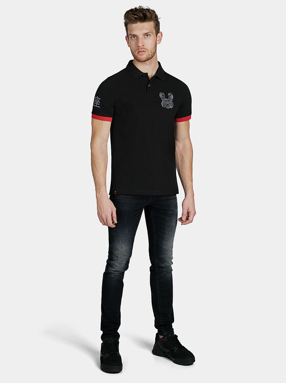 Black polo-shirt with contrasting embroideries - 1