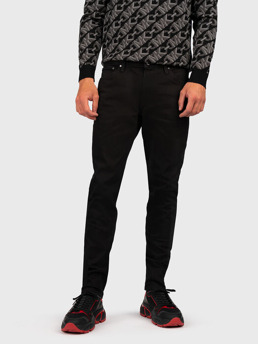 Black slim jeans with logo patch