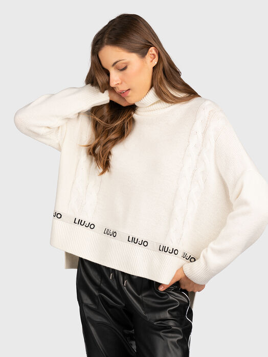 Sweater with jacquard logo motifs