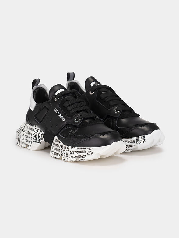 Black sport shoes with accented logo print - 2