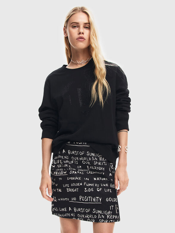 Black mini skirt with contrast print  - 0