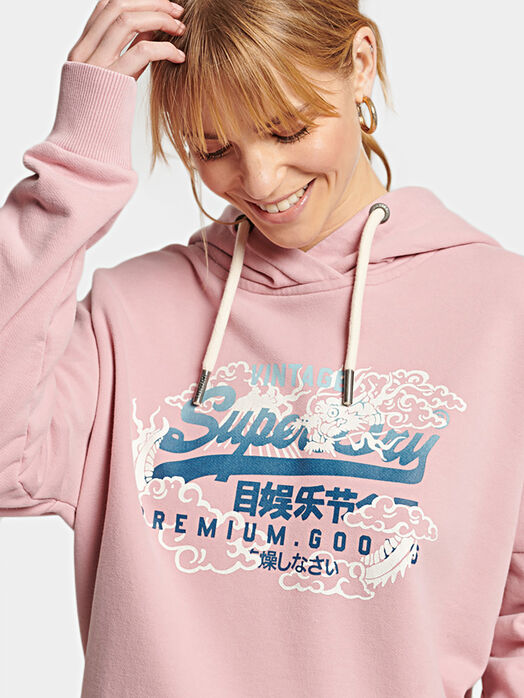 Hooded sweatshirt and logo detail