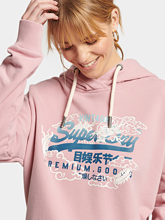 Hooded sweatshirt and logo detail - 1