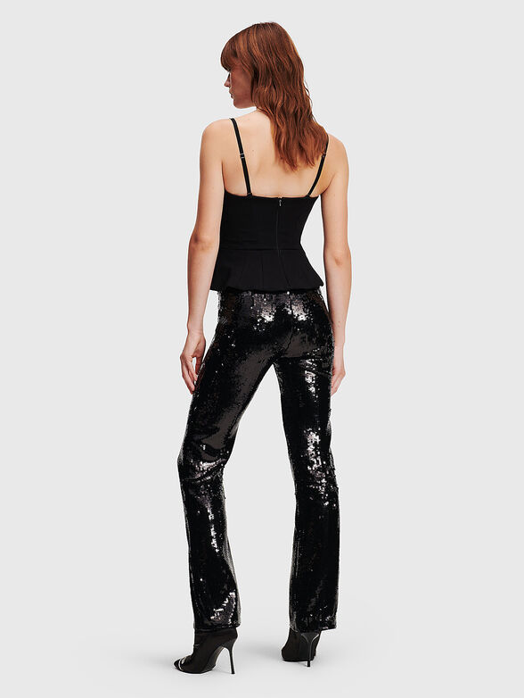 Pants with appliquéd sequins - 1