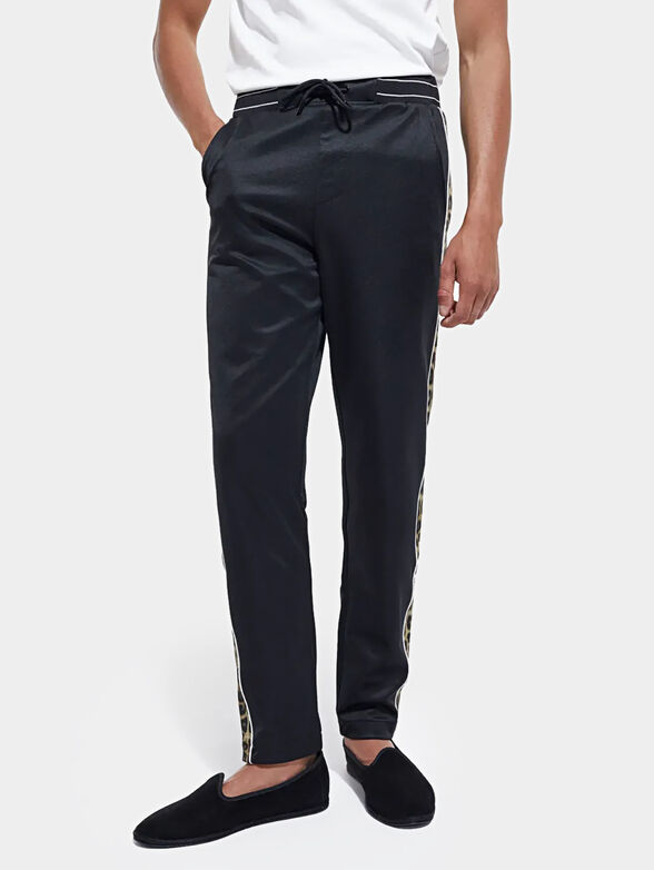 Sports pants with animal accents - 1