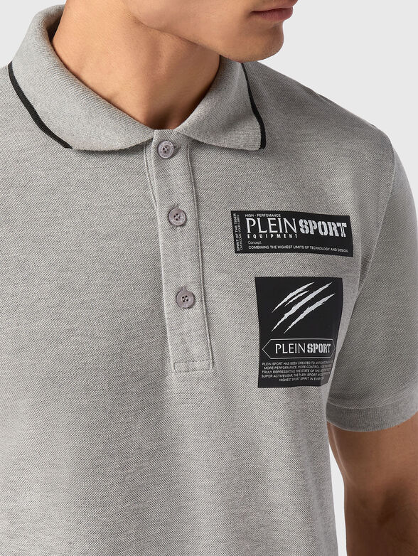 Polo shirt in black with contact logo print - 4