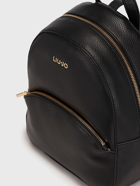 Black backpack with metal logo accent - 3