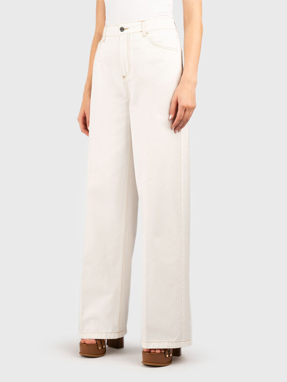 High waisted jeans with accent stitching - 0