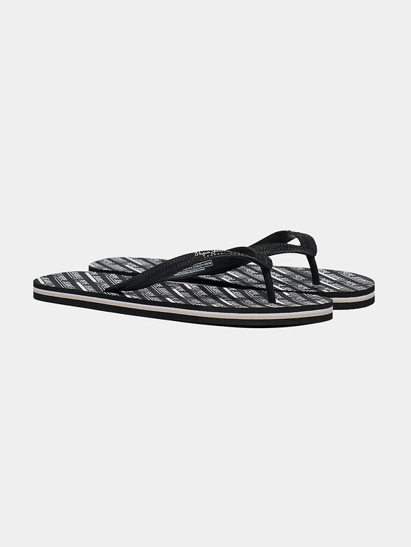 Black flip-flops with logo print - 2