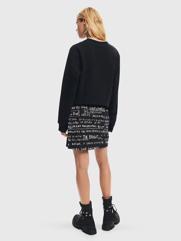 Black mini skirt with contrast print  - 1