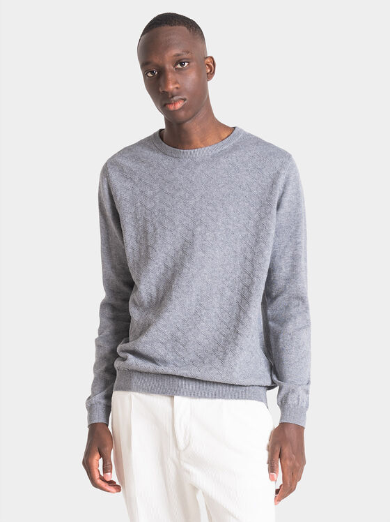 Blue sweater with art details - 1