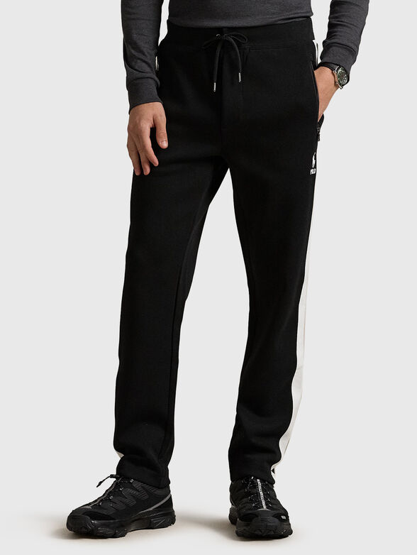 Sports pants with contrasting stripes - 0