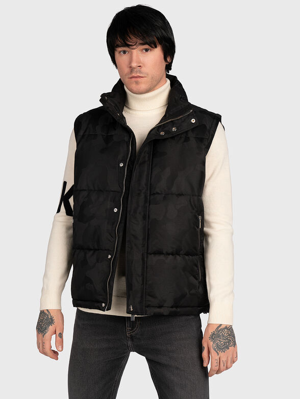Padded jacket with detachable sleeves - 1