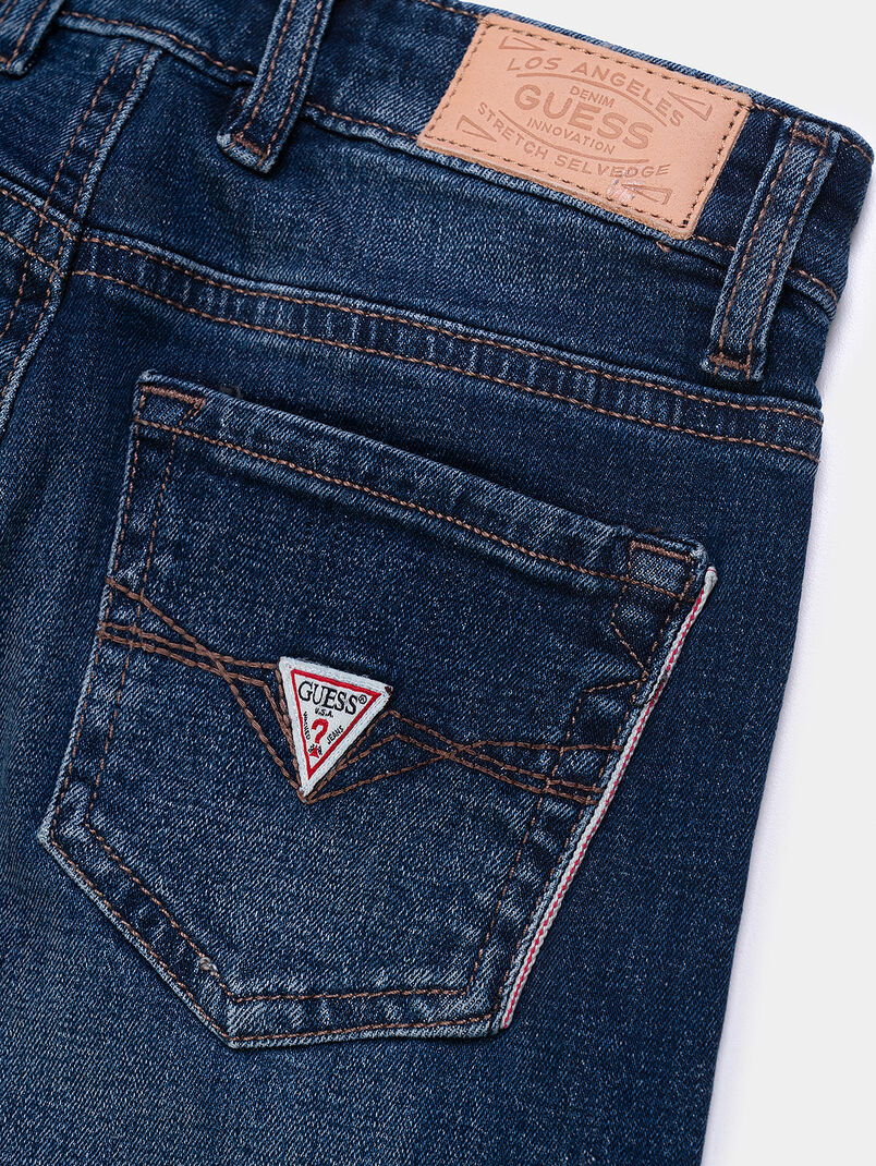 Blue jeans with washed effect and logo patch - 3