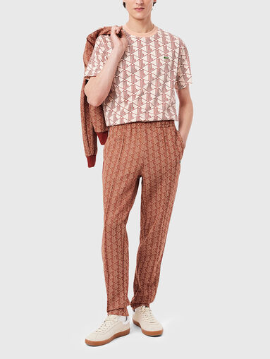 Sports trousers with monogram print - 5