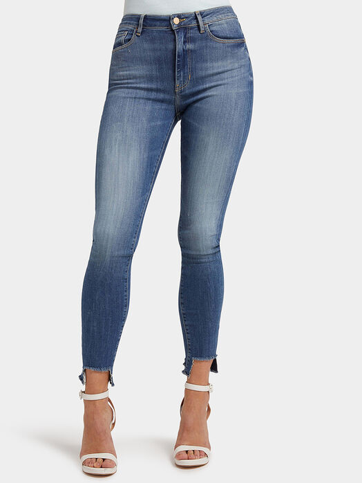 Blue jeans with unfinished hem
