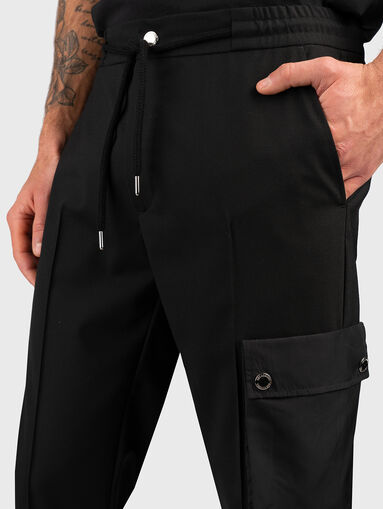 Trousers with cargo pocket - 4