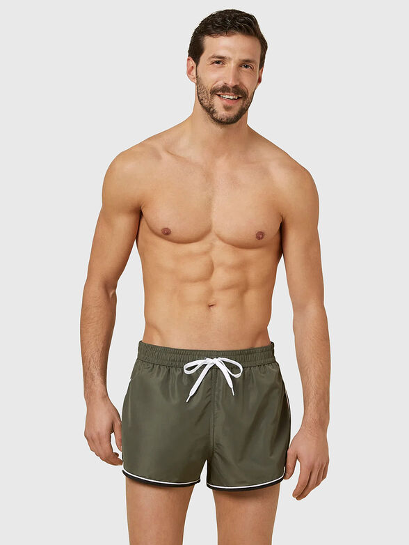 PASSEPARTOUT beach shorts in black - 4