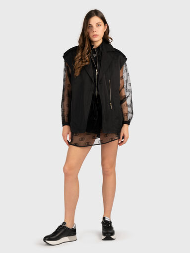 Mini skirt with sheer effect and logo - 4