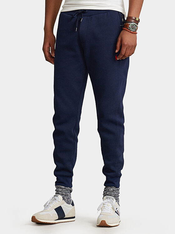 Blue sports pants with logo embroidery - 1
