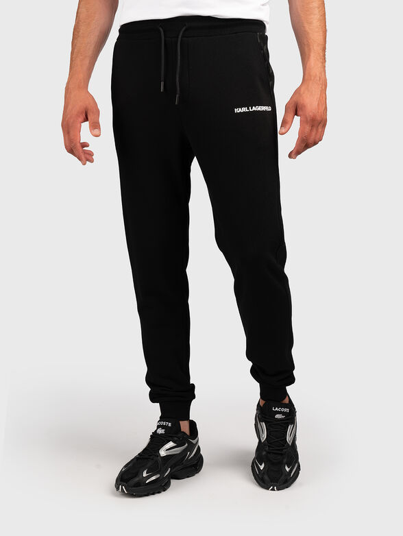 Black sports trousers with contrast logo - 0