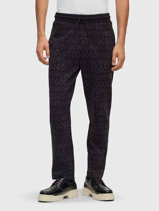 Sports trousers with monogram logo print