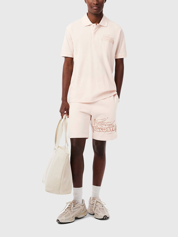 Cotton shorts with logo print in ecru - 4