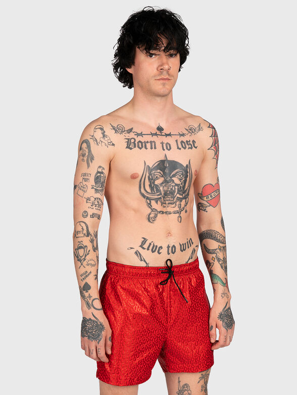 Beach shorts with monogram logo print - 1