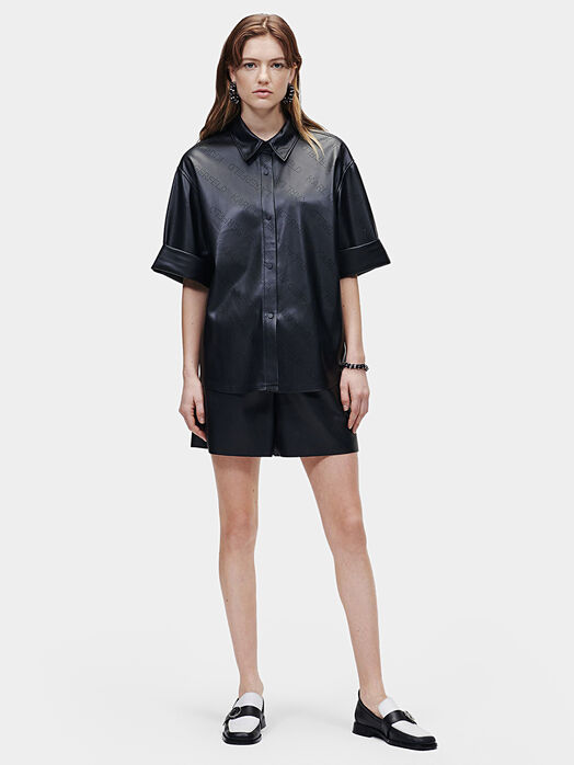 Black faux leather shirt with perforated logos
