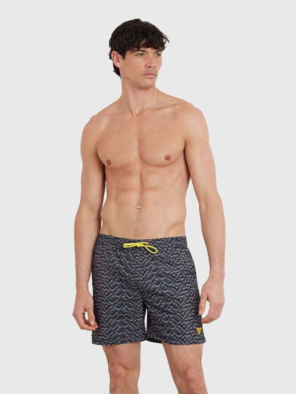 Beach shorts with logo print in grey - 1