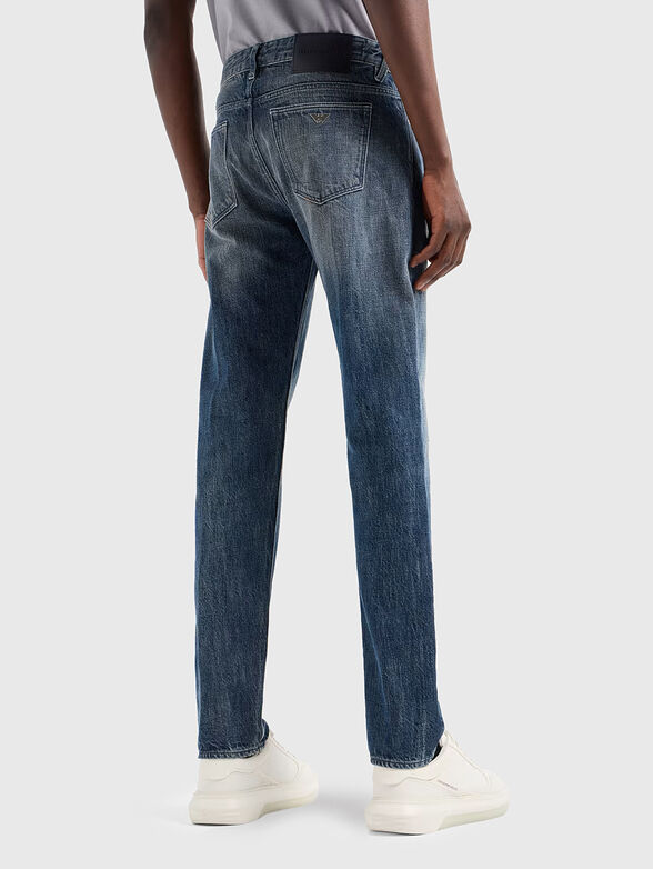 Blue jeans with washed effect and logo - 1