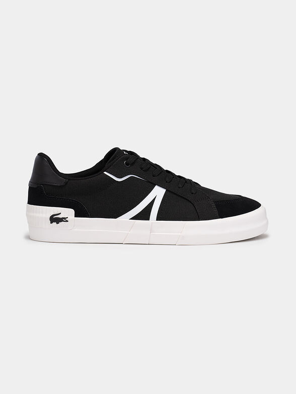 Black sneakers with laces and white accents - 1