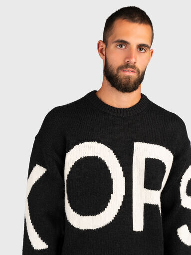 Knitted sweater in black color - 5