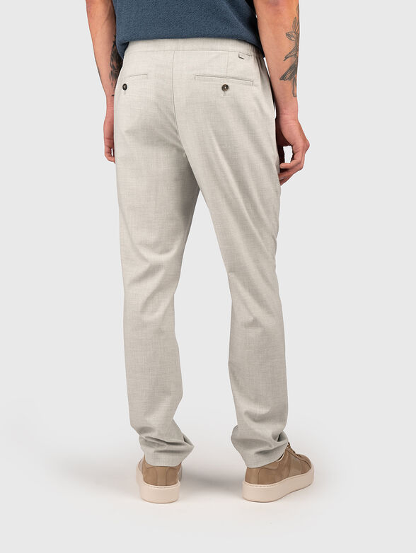 Trousers with waist  ties and pockets - 2