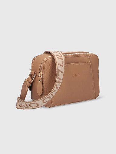 Crossbody bag with logo accents on shoulder strap - 4