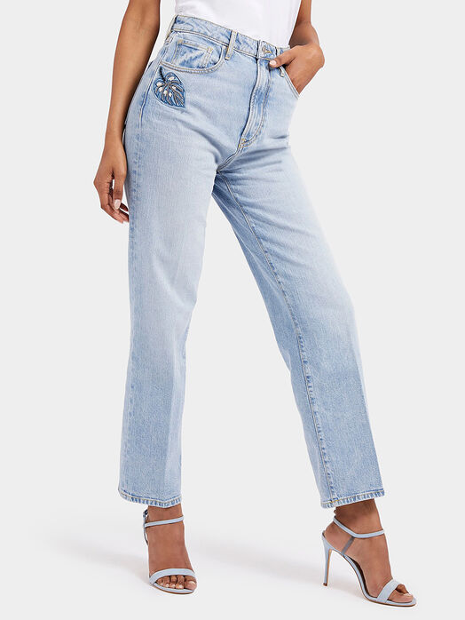 Light blue jeans with beaded accent