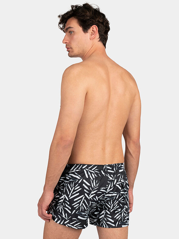 Black beach shorts with print - 2