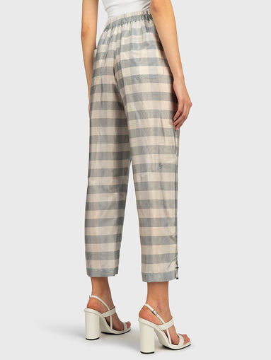 Pants with a checkered print - 2